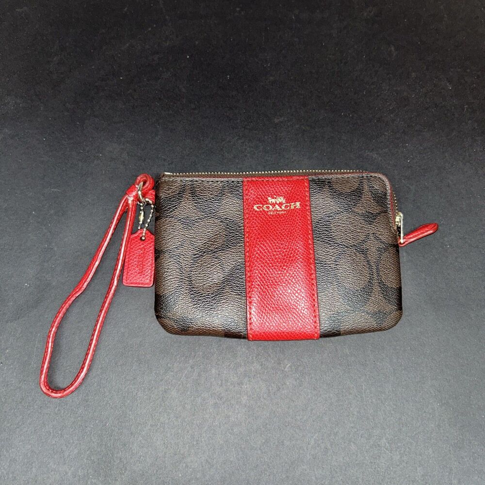 COACH Corner Zip Wristlet Walnut Signature Canvas Bold Red Leather Stripe